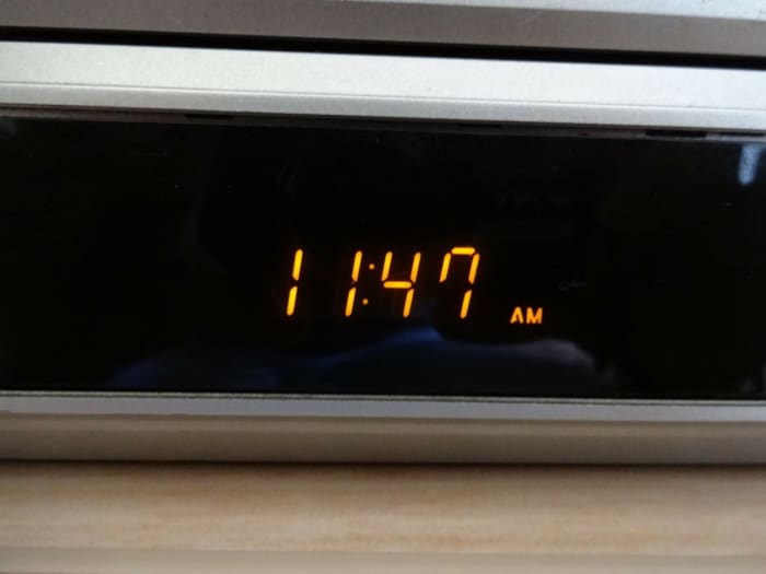 Alarm clocks can lead to anxious thoughts. The light from digital clocks is worse. If you need an alarm to wake you, put it under the bed, throw a scarf over it, or in a cupboard; somewhere you can't see it but will still hear it in the morning!