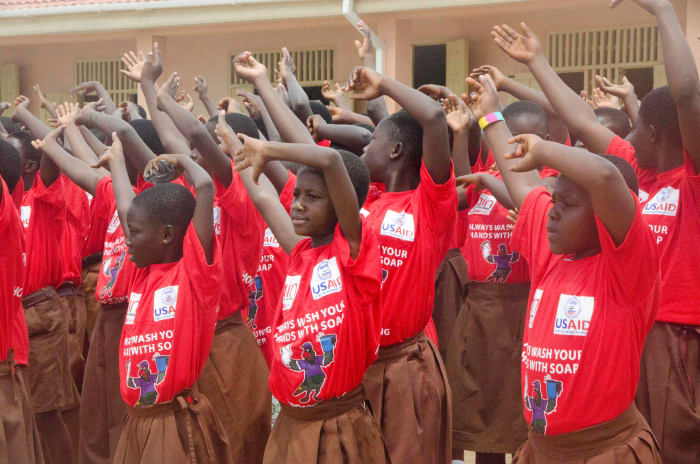 Children celebrate Handwashing Day in Lekma South Cluster of Schools, where USAID has built school bathrooms and handwashing stations to prevent disease spread. (USAID/A. Kauffeld)