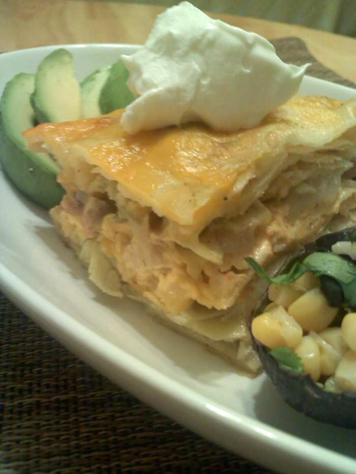 This chicken artichoke enchilada casserole is a meal all by itself. Add a few avocado slices, corn salsa and sour cream to complete the plate and enjoy.