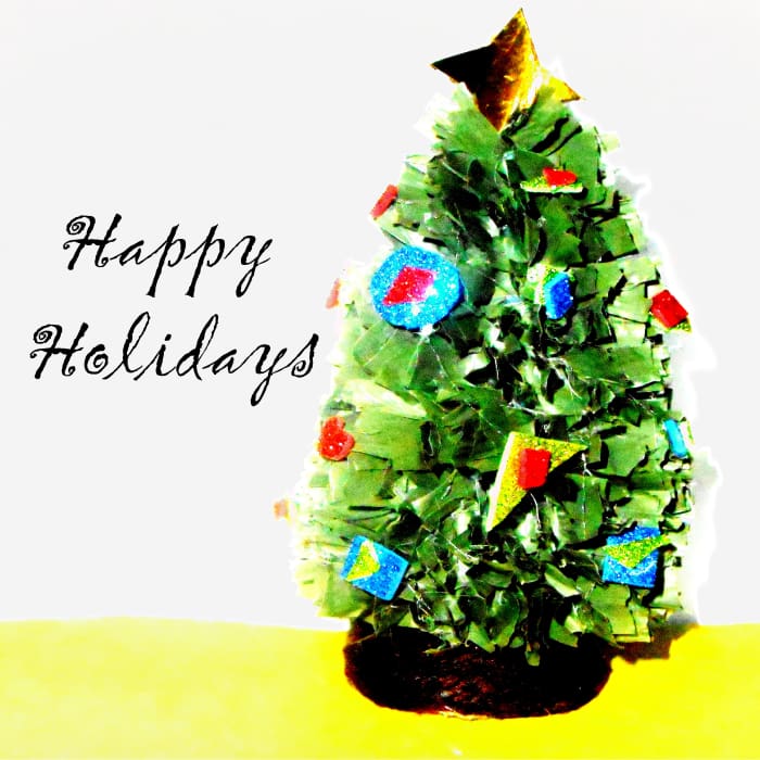 This is one of my completed miniature Christmas trees made entirely from recycled materials.