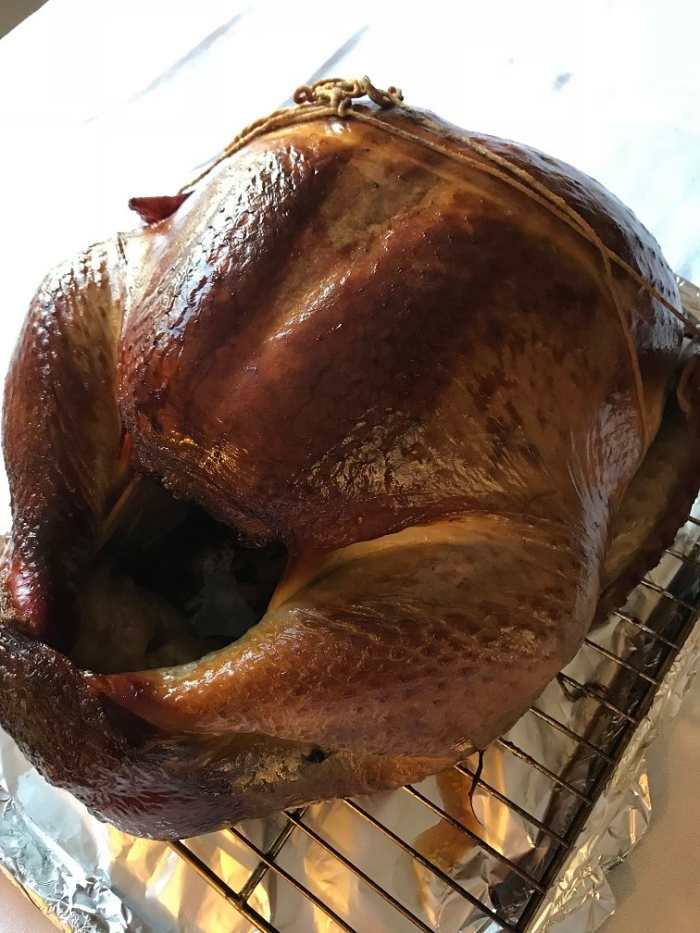 Smoking a turkey is actually one of the easiest ways to get a moist, perfectly done bird. The trick is just in taking some time - and a bit of basting!
