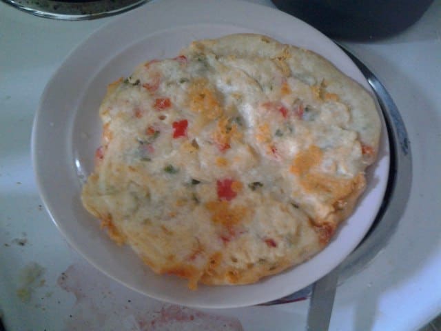 My tortilhas today were made with peppers, tomatoes, cheese and some olives. You can very easily adapt this recipe based on your preferences and available ingredients.