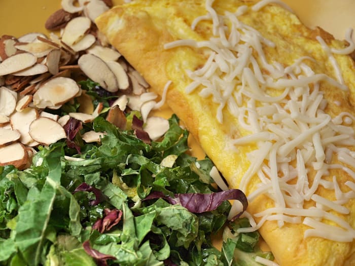 Eggs and cheese are great sources of protein, so make yourself an omelette for dinner. Be sure to include a salad of raw vegetables as well.