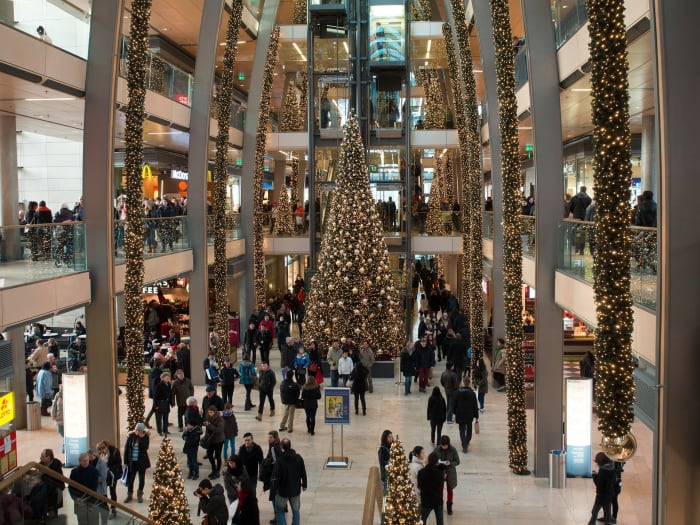 The temptation to spend too much money on Christmas presents, food, and social activities is everywhere.