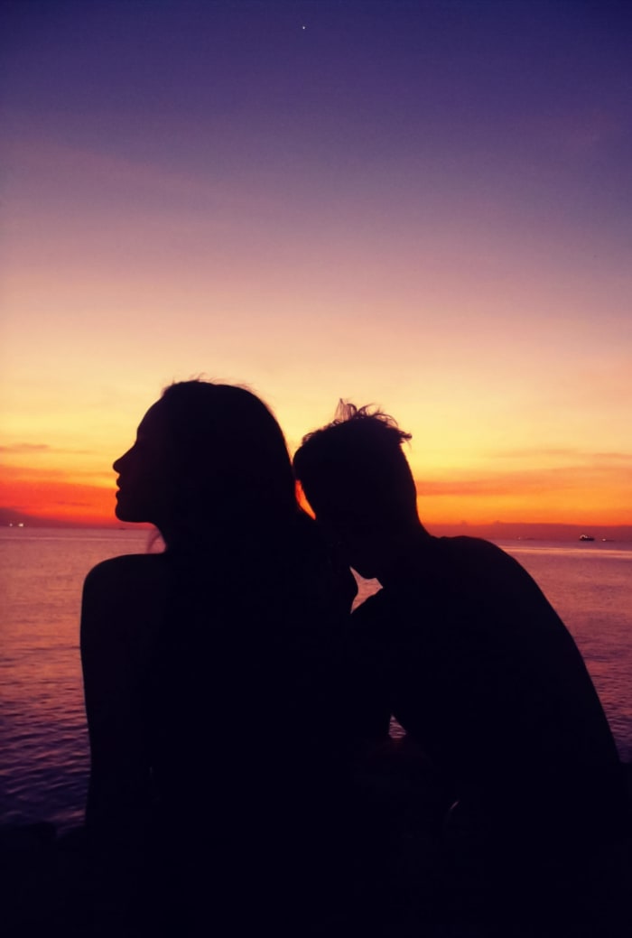 This was also taken at The Baywalk. The angel of the subject plus the vibrant colors of the sunset make it more dramatic. I also made this as a book cover of my on going book, Endless Summer Night.