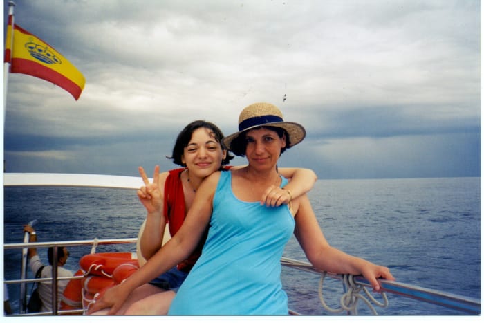 That's me, well on my way to fat-land in 2003, somewhere on the Costa Del Sol in Spain. That's my daughter with me! I was 52.