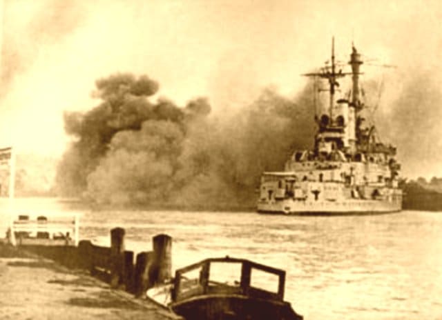 German Battleship Schleswig-Holstein firing point-blank at the Polish garrison on Westerplatte. September 1, 1939.