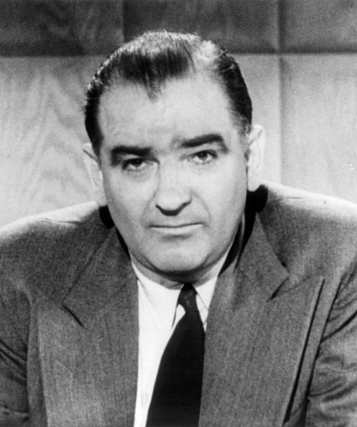 McCarthyism is named after Senator Joseph McCarthy, who was a leading figure in the hunt for so-called Communist subversives. The roots of the phenomenon were in place before Joseph McCarty first became involved, however.