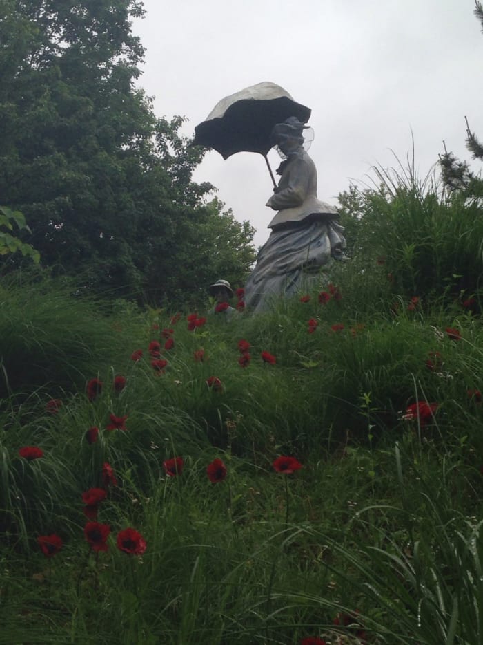 Grounds for Sculpture's 'On Poppied Hills' (artist Seward Johnson) inspired by Monet's "Lady with a Parasol"
