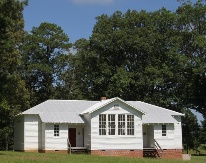 Today's students may not be aware of the history of segregated schools in the US. Shown: a Rosenwald school, built in the 1920s to educate Black American students.