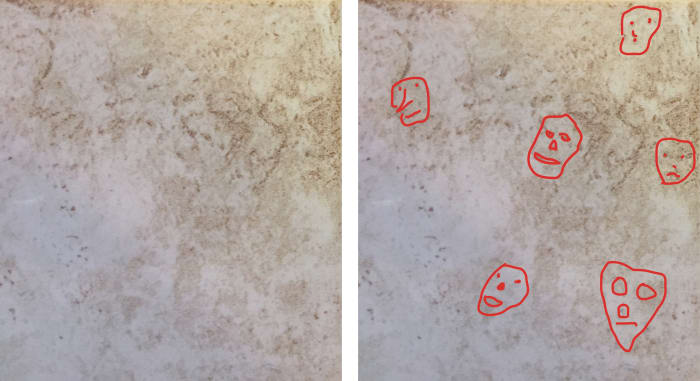 Faces in a pattern on a ceramic floor tile. I see four others that I did not mark, can you see them?