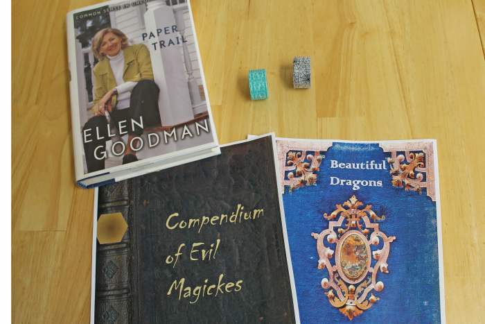 Some of the things you will need to make these wizard-themed books. Printouts of the book covers, a hardback books, washi tape (or colored masking tape).