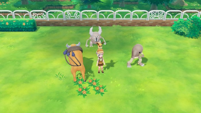 My character with three Pokemon I transferred over from Pokemon Go.