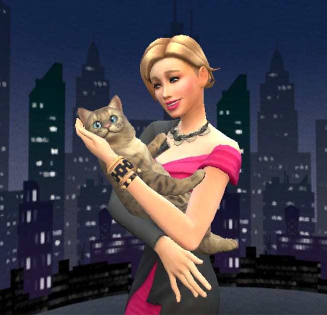 If you have "The Sims 4: Moschino Stuff" pack you can get a tripod that allows you to pose for photos with your pet.