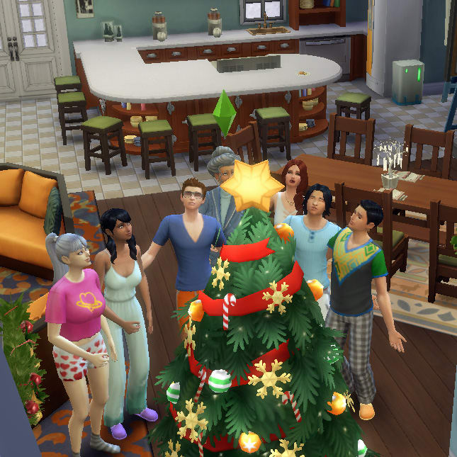 A family stands around the holiday tree at Winterfest singing "Fwingle Zibbs" together.