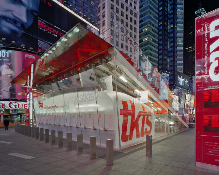 The TKTS Booth in Times Square is located underneath the giant red steps. Image from the website of Perkins Eastman, who designed the structure.