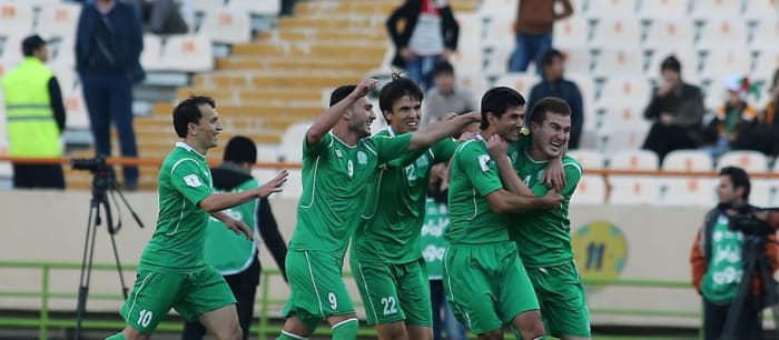 Turkmenistan players celebrate following a goal during a 2018 World Cup qualifier against IR Iran in Dasoguz, Turkmenistan in June 2015.