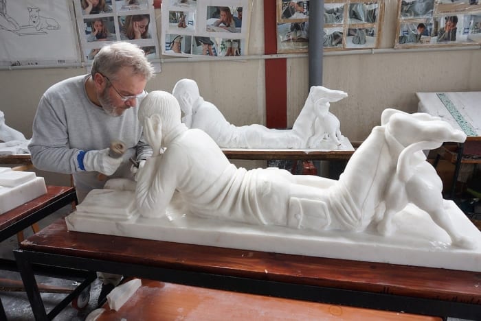 John Wall is busy working on a marble statue. Working with marble is for the more advanced sculptor.