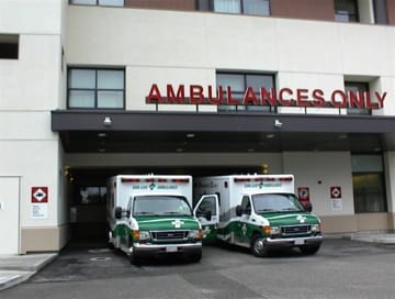 I took this picture of ambulances unloading patients at Twin Cities Hospital last summer, long before either of us had heart symptoms.