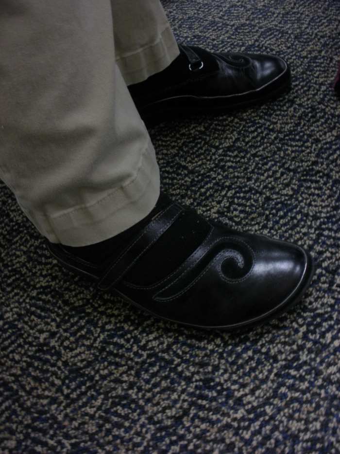 A comfortable pair of shoes that cushions your heels and supports your arches is required.
