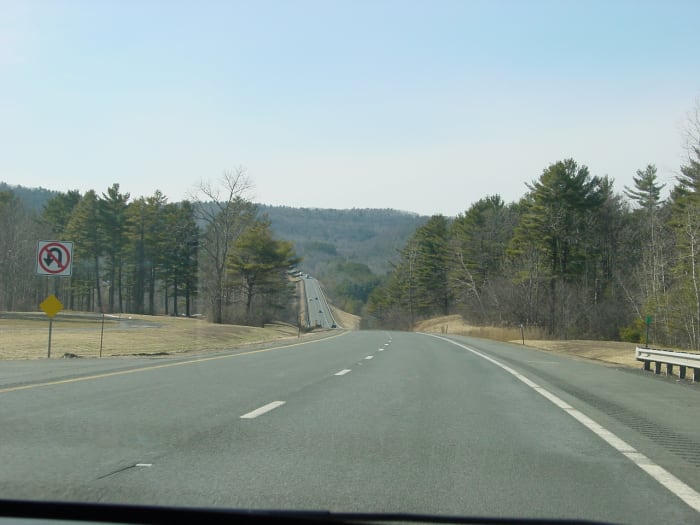 Everyone copes differently before a funeral. Don't feel bad for enjoying the ride and company of others in the car.
