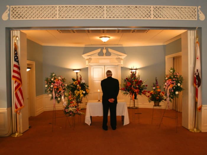The service is hardest on those who are closest to the deceased. Give them space to mourn, but let them know that you're there for them.