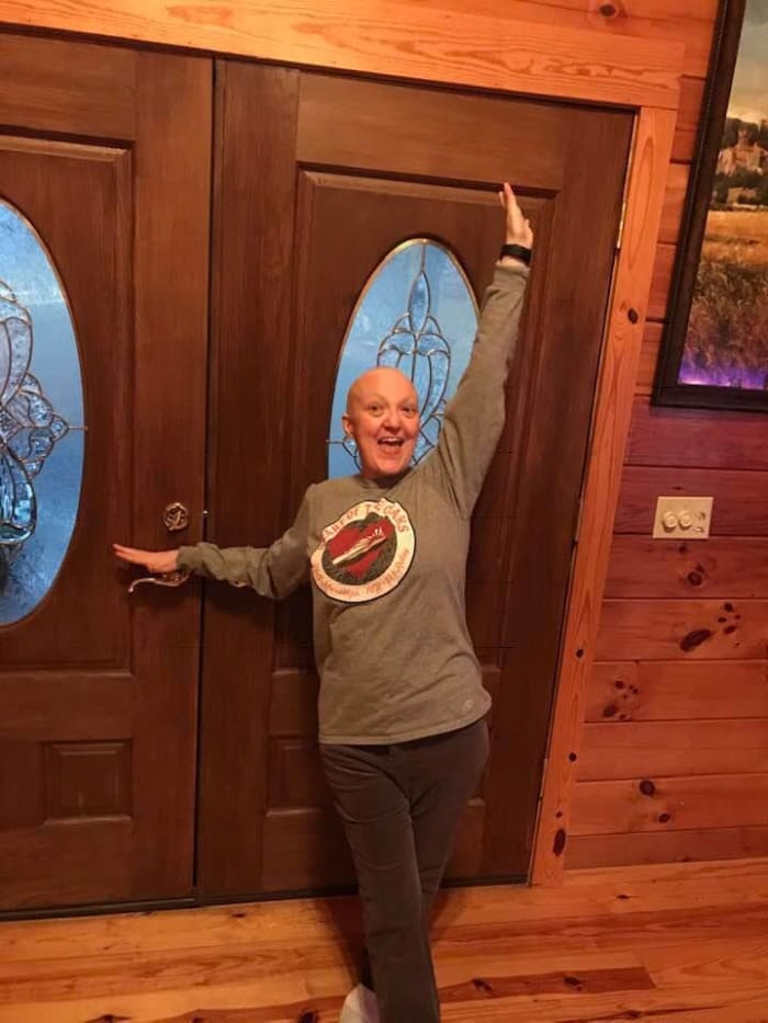 Me with my bald head announcing to my Facebook friends and family on January 22th that I am in remission from cancer. Yay!