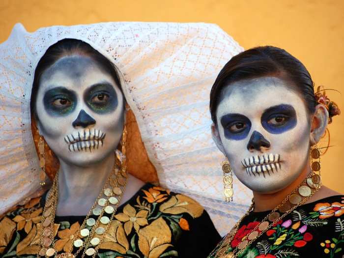 Day of the Dead celebrations in Mexico and other Latin American countries include surreal face paintings