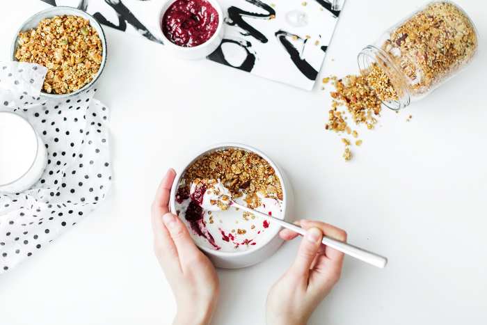 Kefir and yogurt are two excellent ways to increase your probiotic intake because they keep the healthy bacteria alive all the way to their destination!