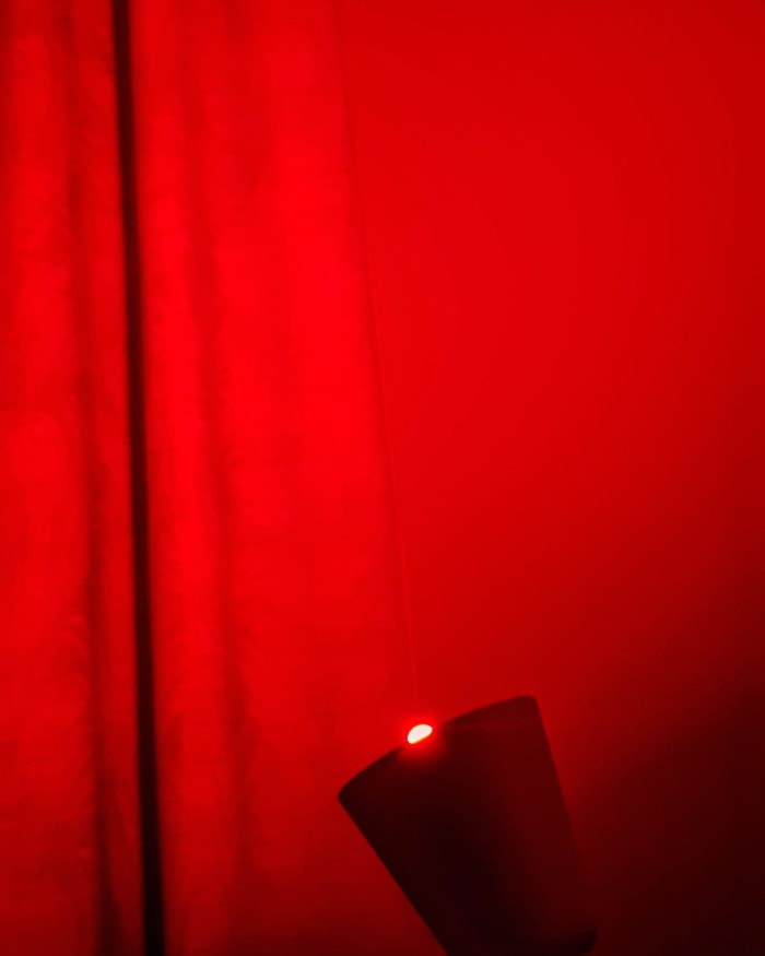 This is the red light that I use in my room, which boosts the production of melatonin in my body and aids me in falling asleep.