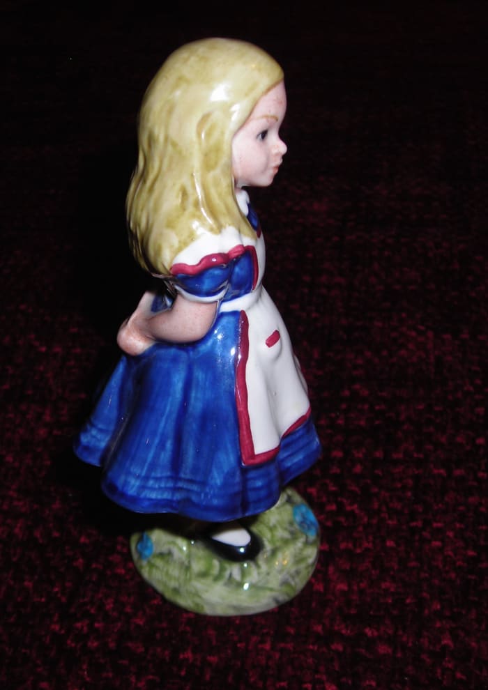 Beswick/Royal Doulton figurine of Alice in Wonderland, style one, Royal Doulton under license from Beswick