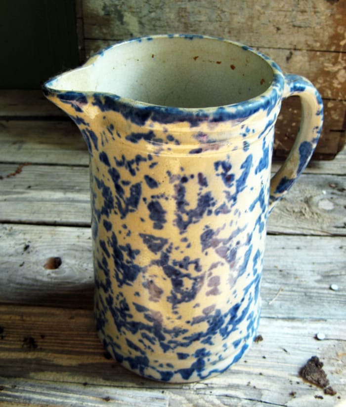 Over 100 years old, you can see the wear on this piece which adds to its charm.