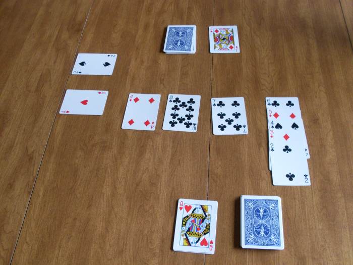 This is what your cards will look like once the play has been going on for awhile. Notice there are aces being built on in the left hand side.