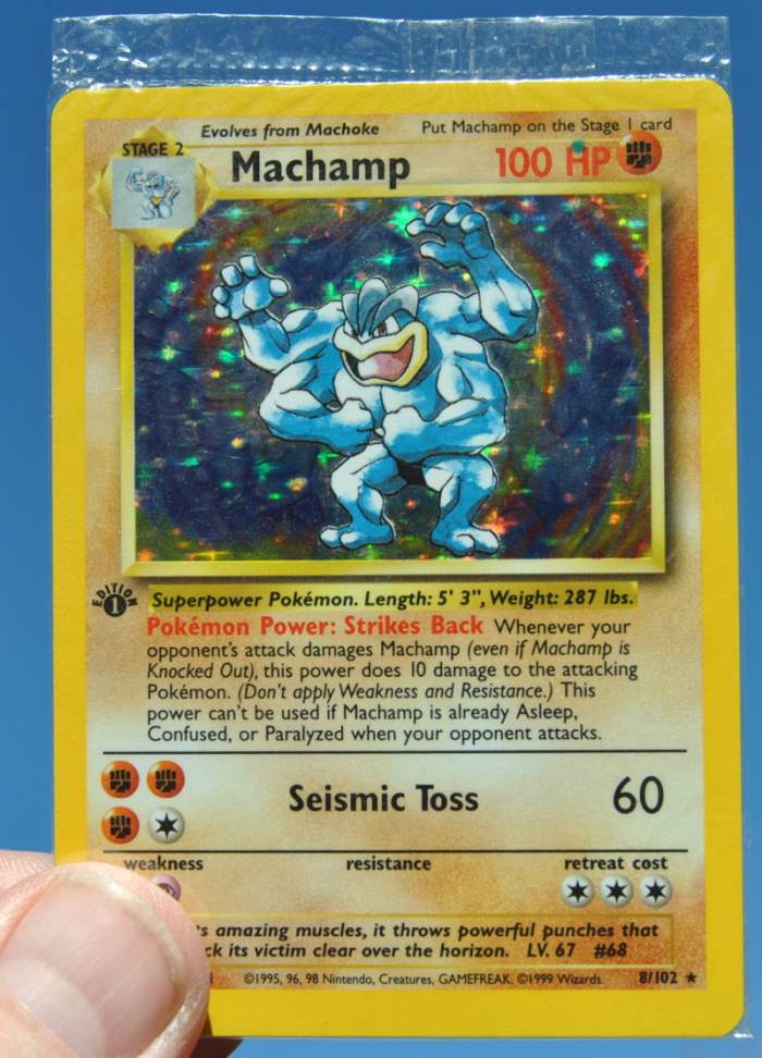 The Holofoil 1st Edition Machamp is NOT considered to be rare. This card is shown in the original packaging as it was presented in the 2 Player Starter Set.