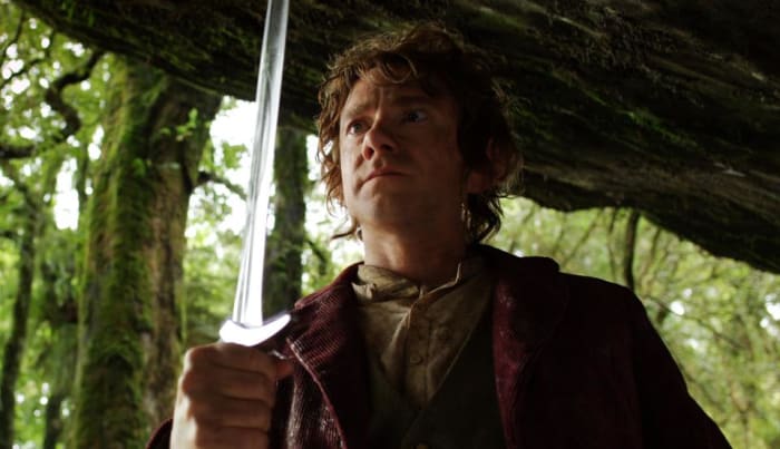 Still from New Line Cinema's The Hobbit film. Here, Bilbo has just found Sting in an abandoned troll-cave