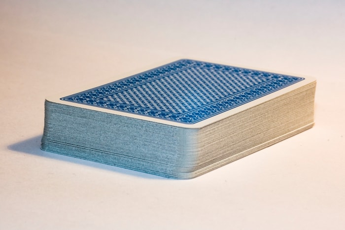 Players draw one card from a stack of cards in the center if they don't have a card to play on their turn. If they can play the card they picked up, they may put it down. Otherwise they must add it to their hand.