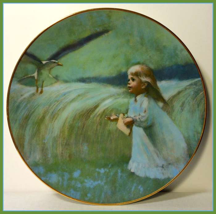 Precious Moments collection "A Friend in the Sky" 1979 plate by Thornton Utz for Viletta. A girl with a piece of bread in one hand and a part of that bread in the other, offering it to the bird flying overhead as she looks at it in awe.
