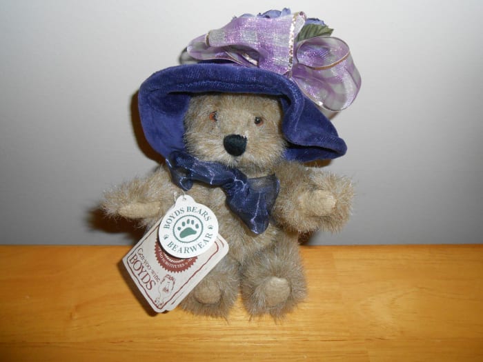Here's one of the sweetest Boyds bears I have found. You can see she has 2 tags intact which increases her collectible value.