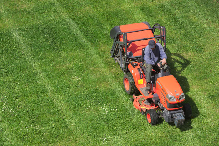 A commercial lawn tractor, not mower. You must know the difference so you can understand the narrative below.