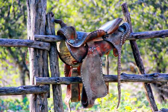 This is a saddle for your butt to sit on while riding on a horse at a dude ranch.