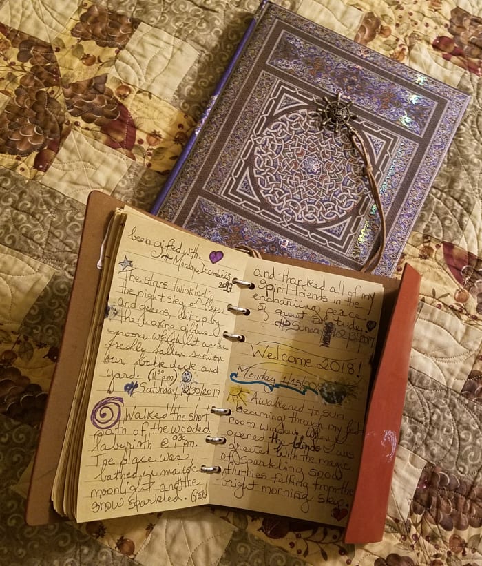I keep several journals for different types of reflection and expression. The top one is my "Journal of Enchanting Moments," which focuses on my encounters with nature. Below it is my Dream jounral.