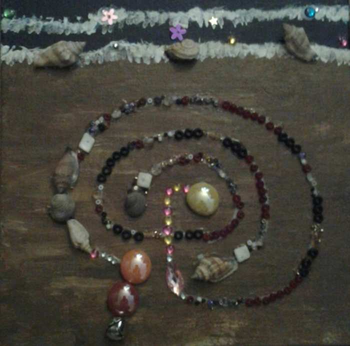 Seafarer Mama's tabletop seashore labyrinth, which she walks when the wooded labyrinth is covered with snow and ice.