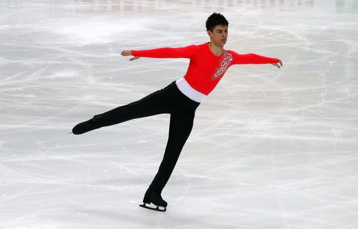 This is a male ice skater. Notice his style. Now look at the female ice skater at the photo at the bottom.