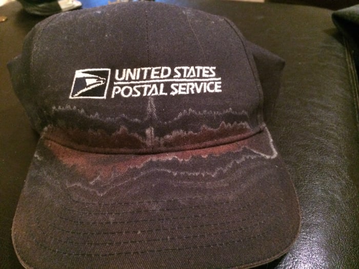 The U.S. Postal Service doesn't provide its temporary workers with uniforms, but it does give them a hat. This hat was encrusted with sweat after a couple of weeks working in the summer heat.
