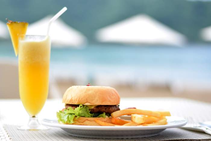 An early dinner or a filling late lunch can be less expensive than a restaurant meal during the dinner rush hour.