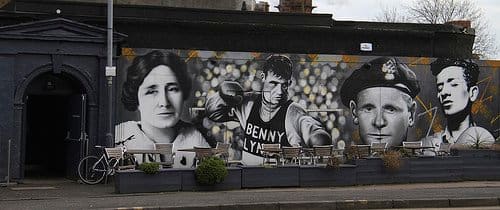 Johnny Ramensky is shown on a mural (second from right) outside a Scottish pub.