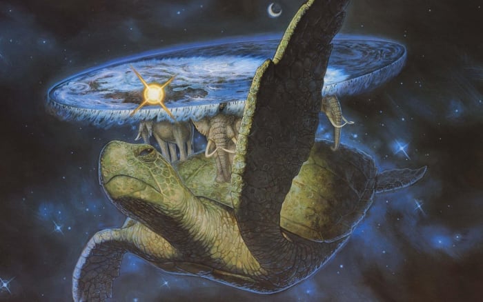 Terry Pratchett's Discworld: Carried on the back of four elephants which in turn stand on the back of the turtle known as the Great A'tuin.