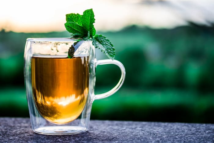 Green tea may reduce the risk of several types of cancer, as well as slow the growth of existing cancers.