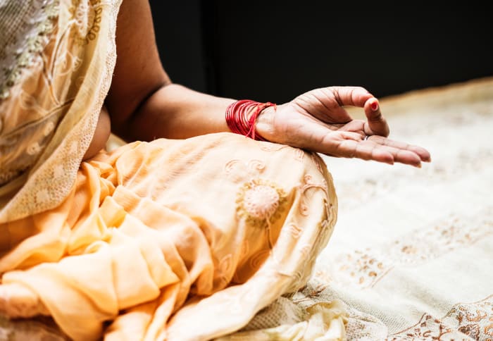 Repeating a mantra can help you focus on the purpose of your meditation and keep your mind from wandering.
