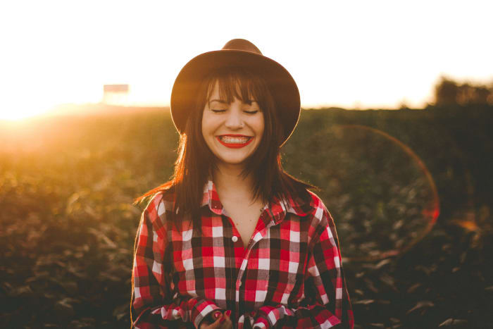 It's difficult to laugh during dark times, but you'd be surprised how uplifting a simple smile can be.